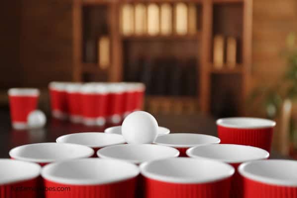 ping pong ball in a cup