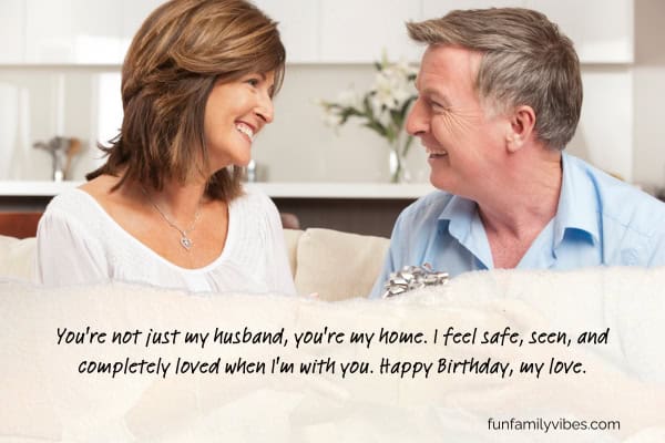 Woman giving birthday gift to husband, with birthday wish overlay