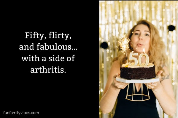 Woman celebrating 50th birthday, blowing candle on cake, with quote on the left side