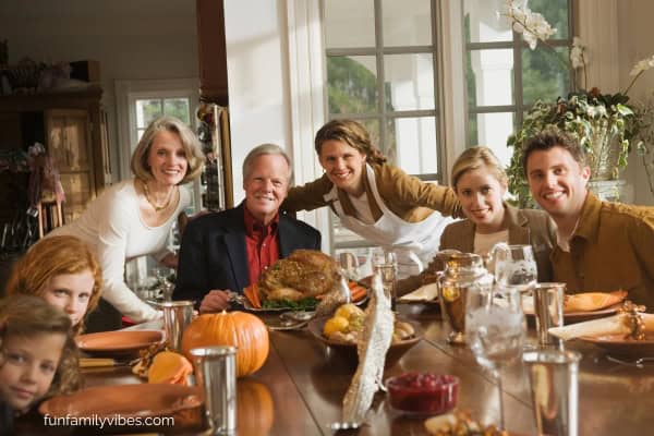 happy family at Thanksgiving dinner