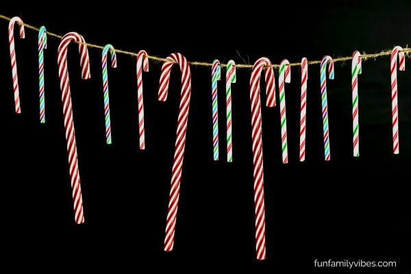 candy canes hung on string
