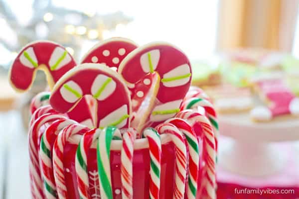 candy cane candies and candy cane cookies arranged in a big cup