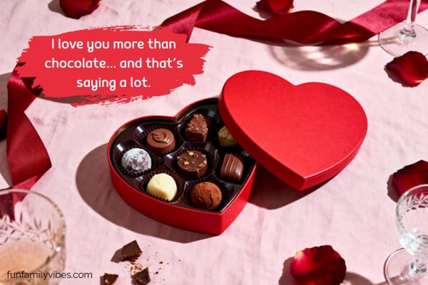 chocolates in heart shaped box, with quote overlay
