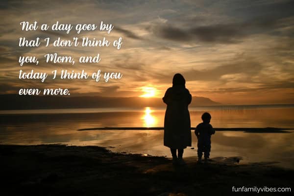 Silhouette of mother and child during sunset at the beach, with quote overlay