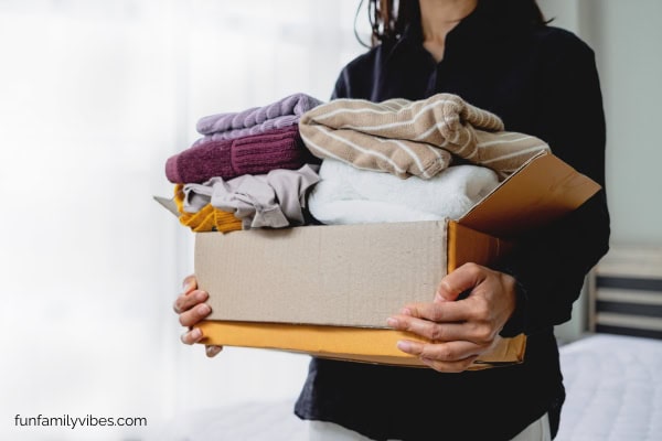 woman decluttering clothes