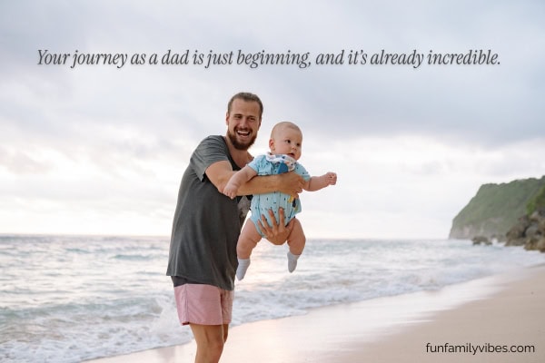 A father holding his baby at the beach, with quote overlay