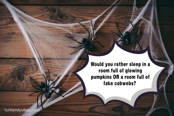fake cobwebs and spiders with question overlay