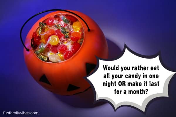 pumpkin treat or trick bag full of candies with question overlay