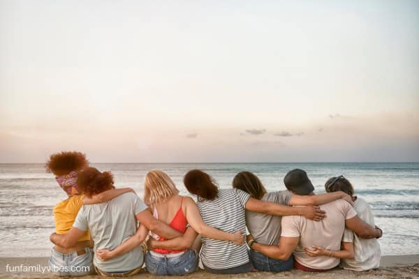 friends hanging out at the beach
