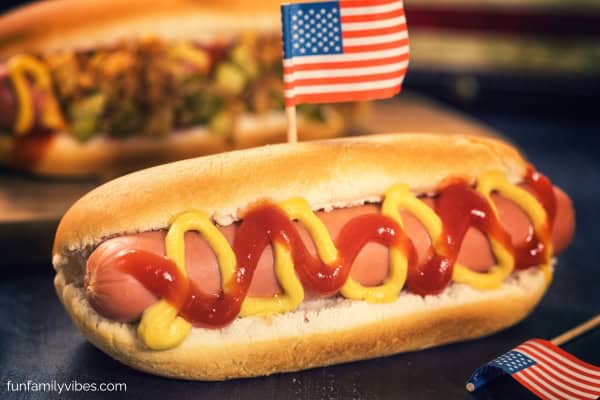 hotdog sandwich with a small American flag