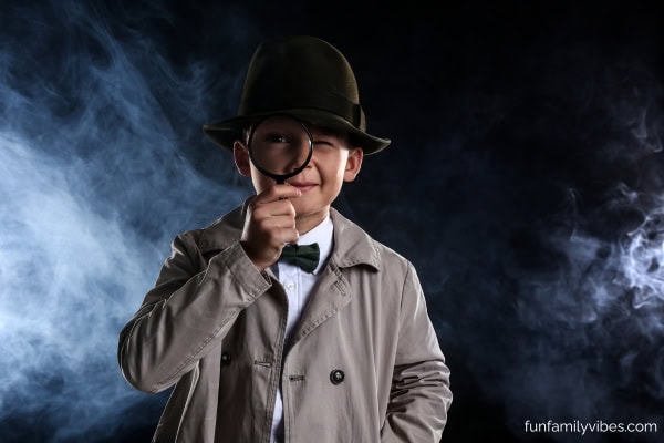 Boy wearing a detective costume