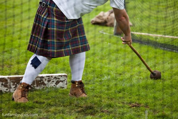 man wearing kilts in a highland game