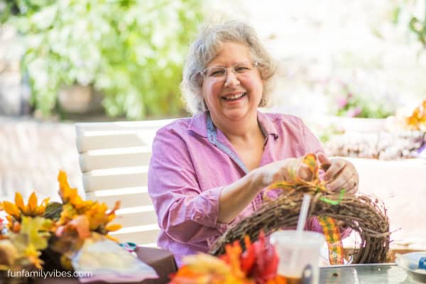 senior woman happily crafting