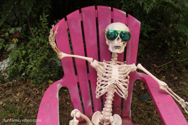 skeleton with sunglasses on a lounge chair