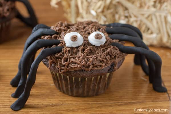 chocolate cupcake decorated as a spider