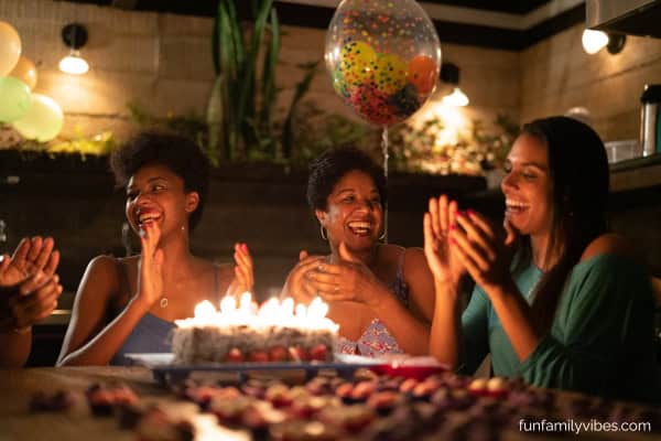 woman celebrating birthday with friends