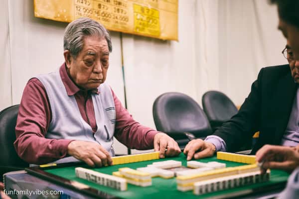 senior citizens playing mahjong