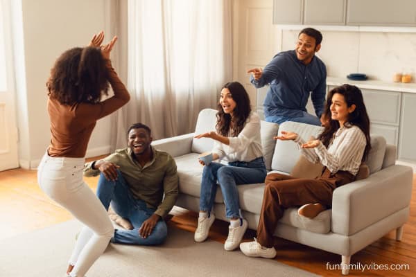 adult friends playing charades